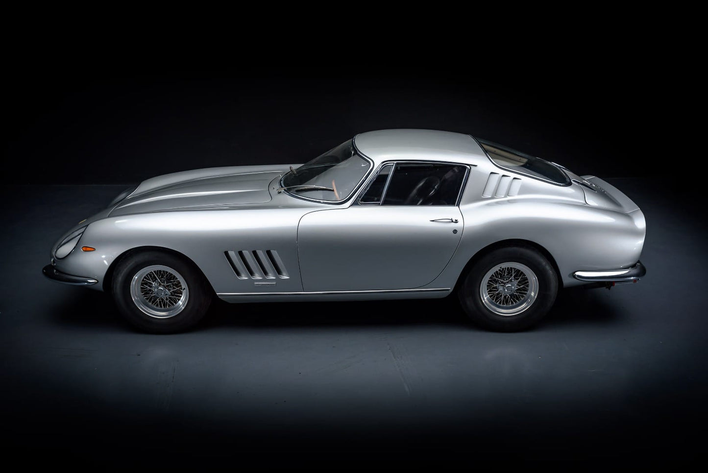 Left side view of the 1967 Ferrari 275 GTB – Classic long-nose styling with sleek Ferrari lines.