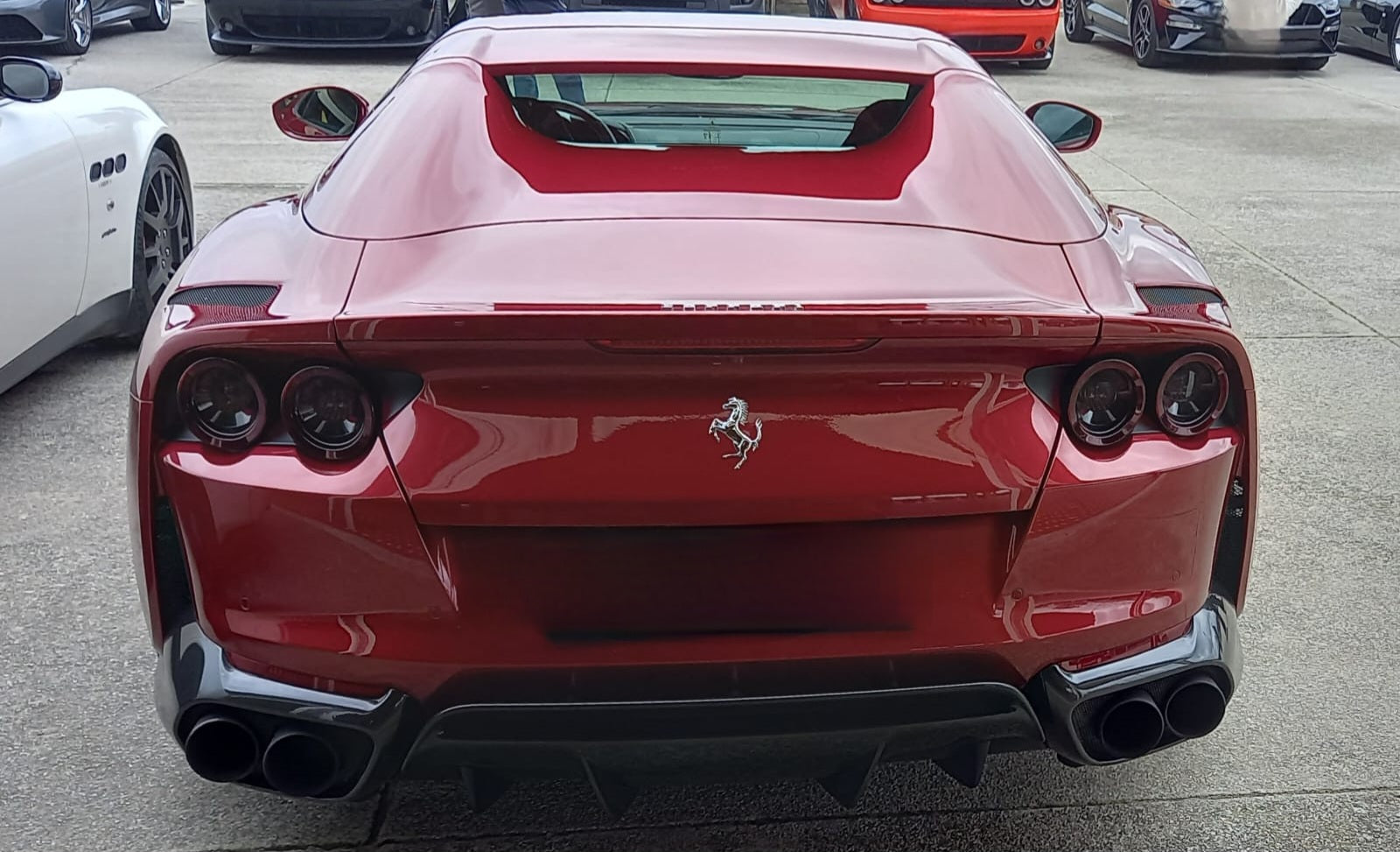 Rear view of the 2022 Ferrari 812 GTS highlighting its aerodynamic lines.