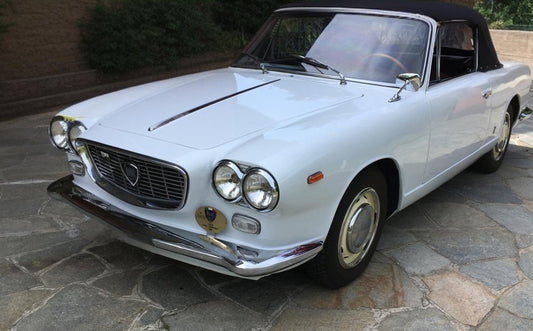 1966 Lancia Flavia Vignale – Front view with soft top closed, showcasing elegant Italian design.