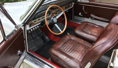 Interior of the 1966 Lancia Flavia Vignale – Vintage cockpit with luxurious craftsmanship and classic details.