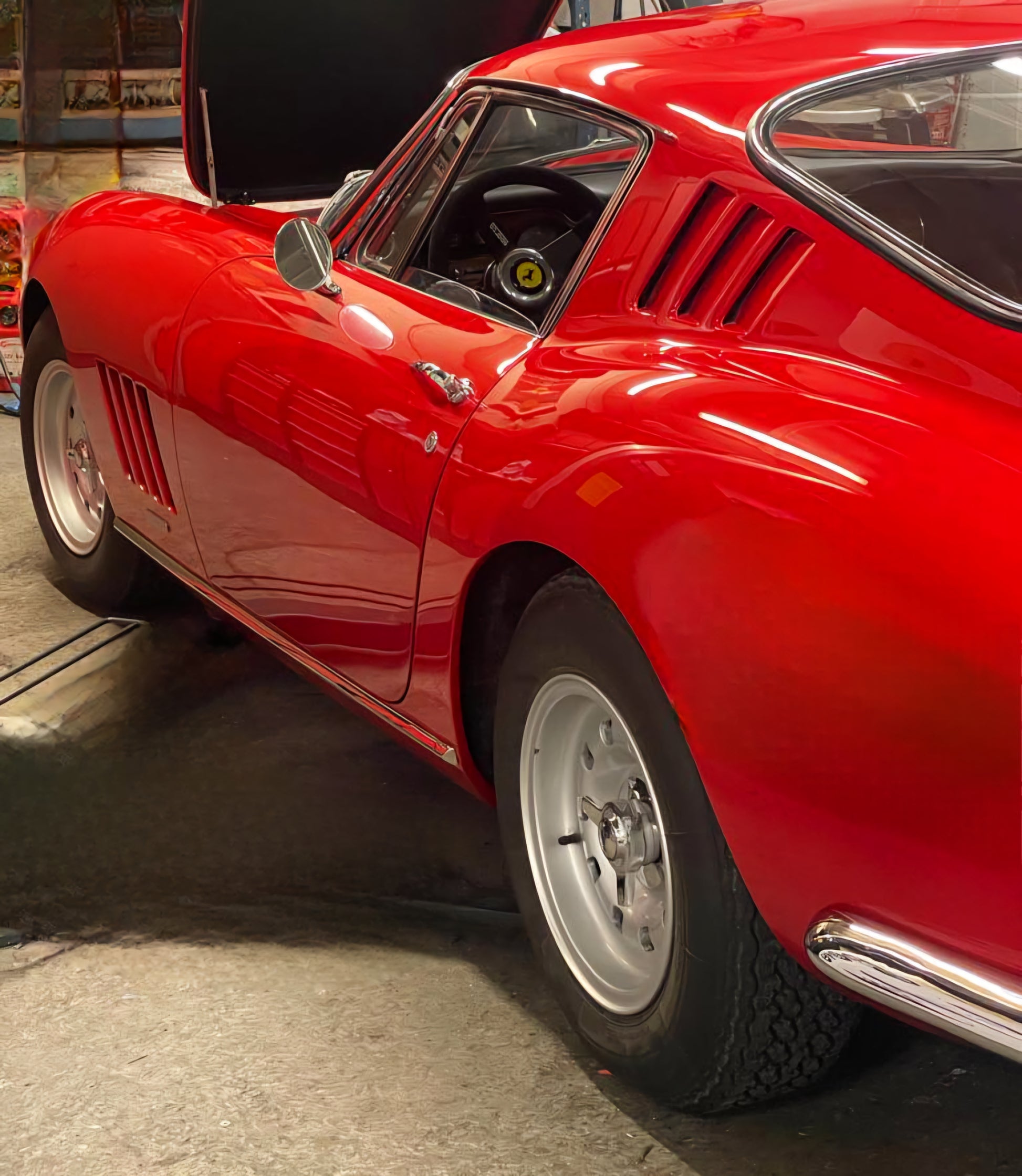 Left side view of the 1966 Ferrari 275 GTB – Classic red exterior with sleek Ferrari styling.