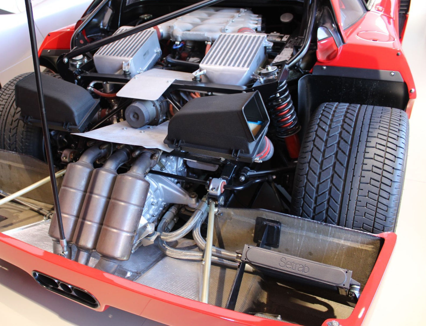 Engine bay of the 1990 Ferrari F40 – 2.9L twin-turbo V8 delivering 478 hp.