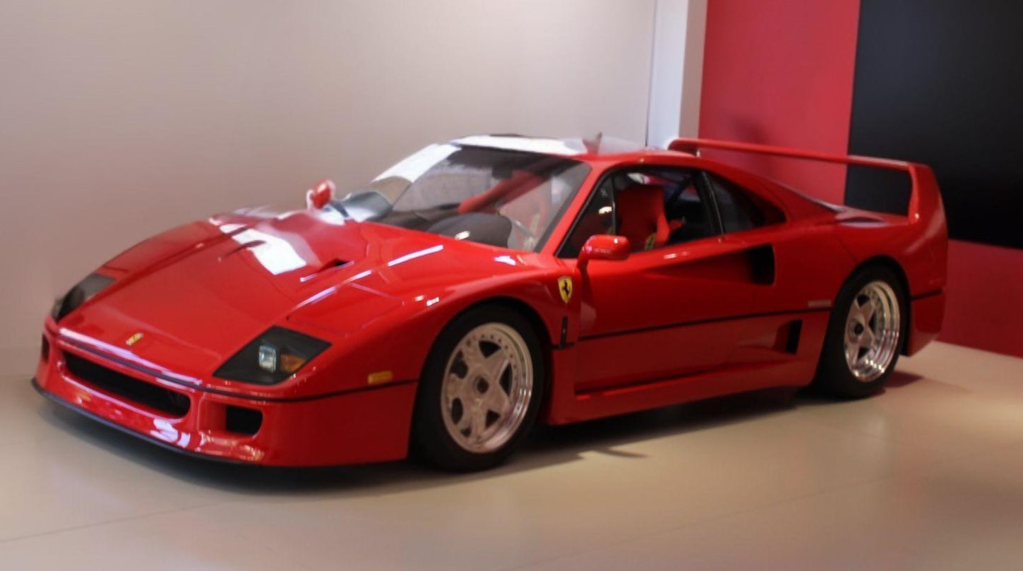 1990 Ferrari F40 – Full view highlighting the lightweight construction and aggressive styling.