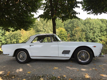 Right side view of the 1961 Maserati 3500 – Elegant coupe with timeless Maserati styling.