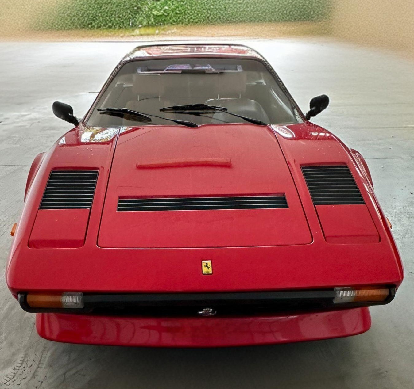 Front view of the 1983 Ferrari 208 GTB – Aggressive aerodynamic design with Ferrari heritage.