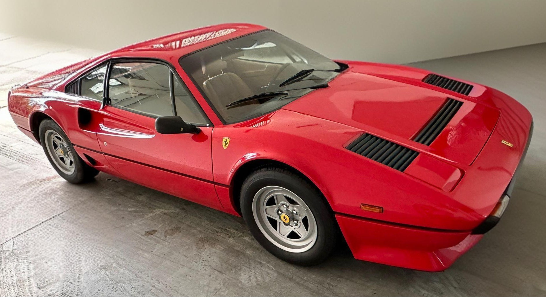 1983 Ferrari 208 GTB – Full view showcasing the sleek turbocharged classic design.