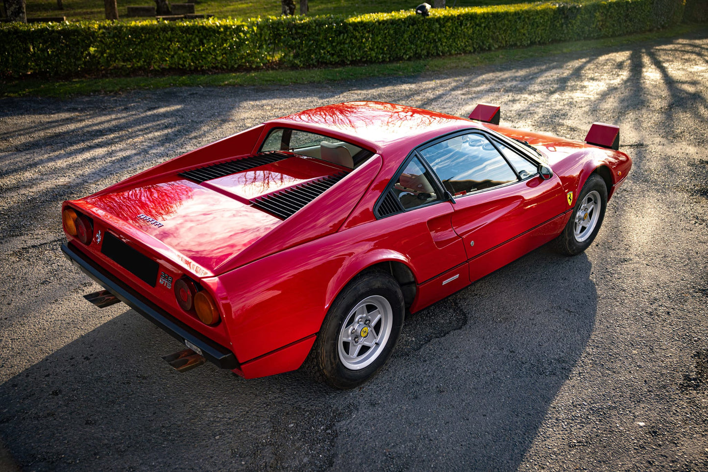 Rear view of the 1976 Ferrari 308 GTB Drysump – Iconic tail design with distinctive Ferrari styling.